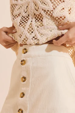 Jupe courte en jean boutonnée