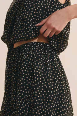Jupe courte fluide à pois