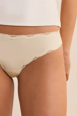 Tanga avec détails dentelle