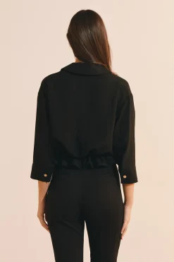 Veste avec détail bouton doré